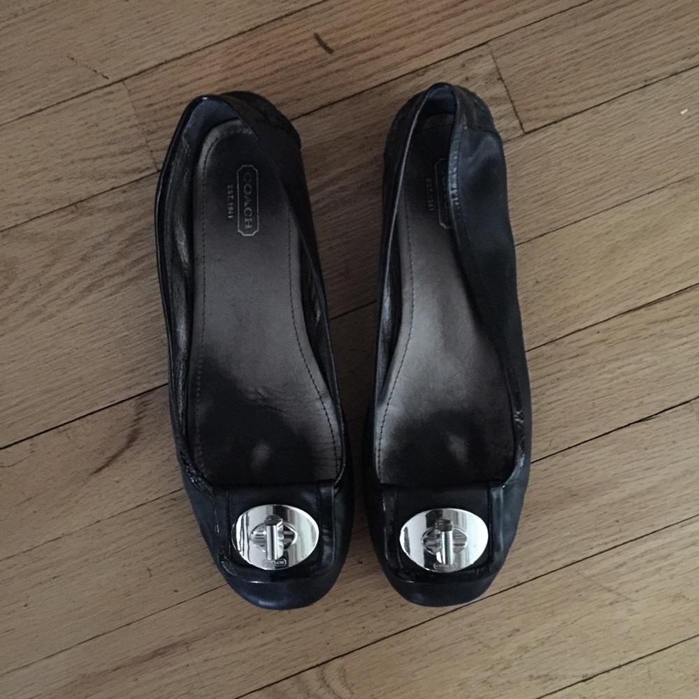 Coach flats; black with turnlock detail